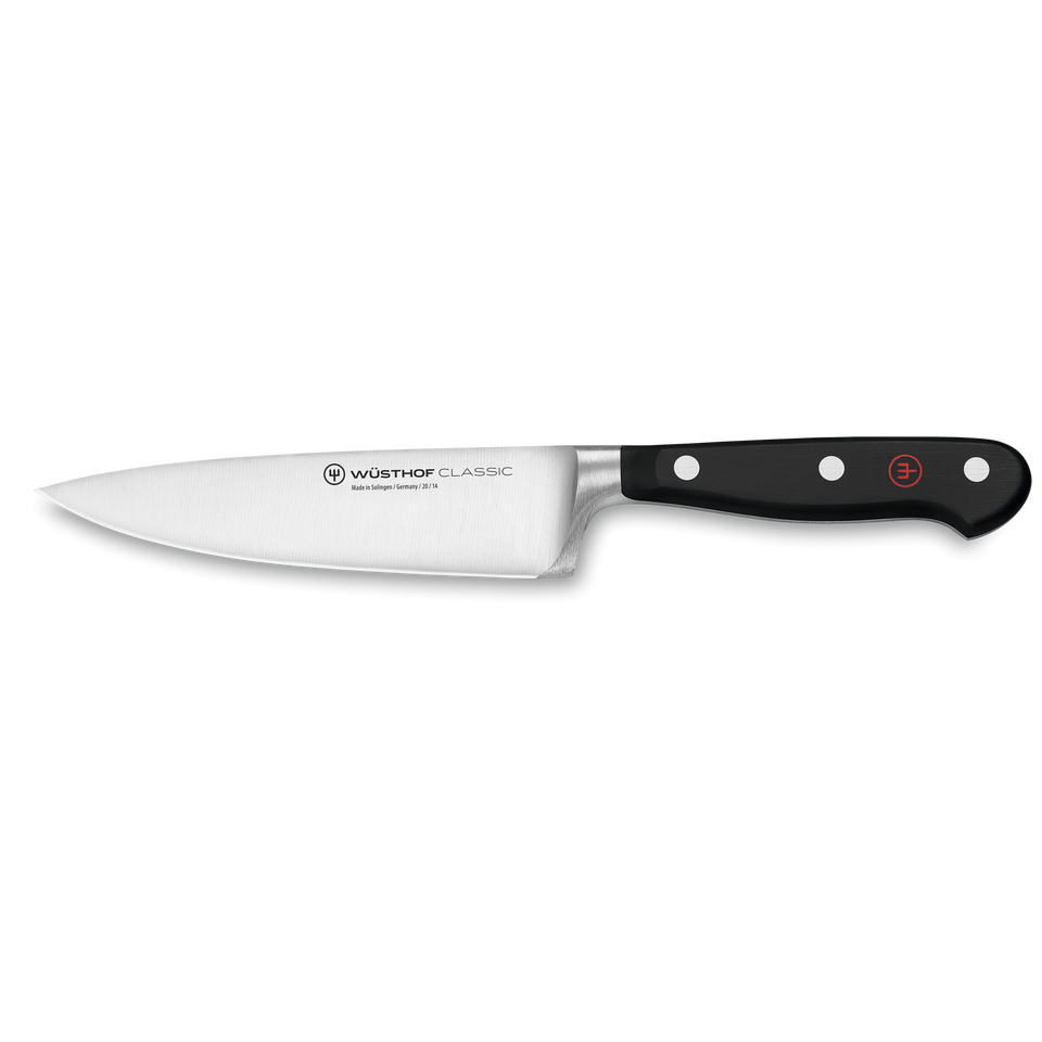 Classic 5" Chef's Knife with a forged German stainless steel blade and a black triple-riveted handle for precise and durable kitchen cutting tasks.