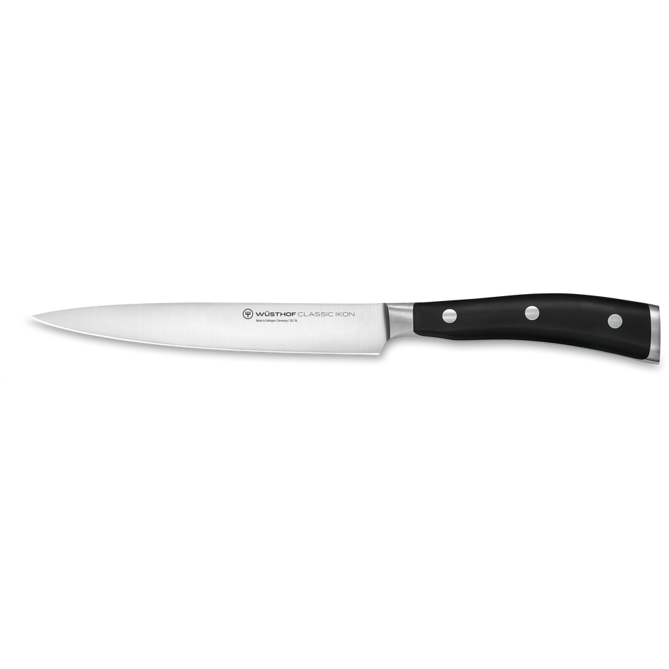 Classic Ikon 6" Utility Knife with a forged German steel blade and durable triple-riveted black handle for precise kitchen cutting tasks.