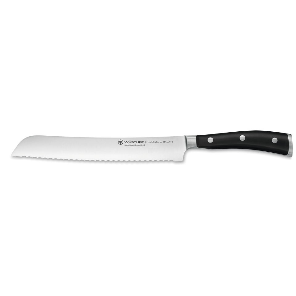 Classic Ikon 8" Bread Knife featuring a serrated forged German steel blade and a triple-riveted black handle for effortless bread slicing.