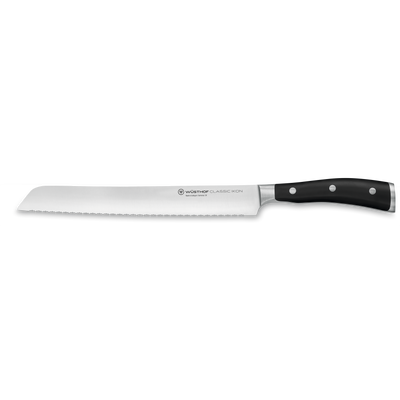 Classic Ikon 9" Precision Double-Serrated Bread Knife with a forged German steel blade and a triple-riveted black handle for clean, precise slicing.