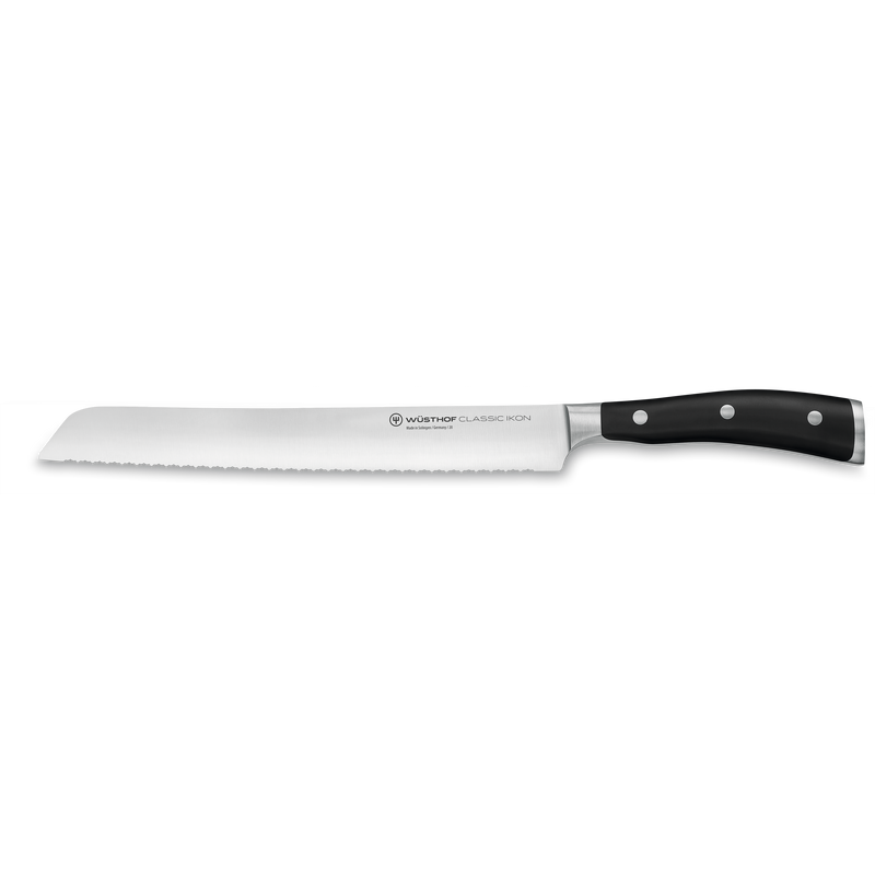 WÜSTHOF Classic Ikon bread knife with serrated forged stainless steel blade and triple-riveted black handle from the Classic Ikon 7-Piece Knife Block Set.