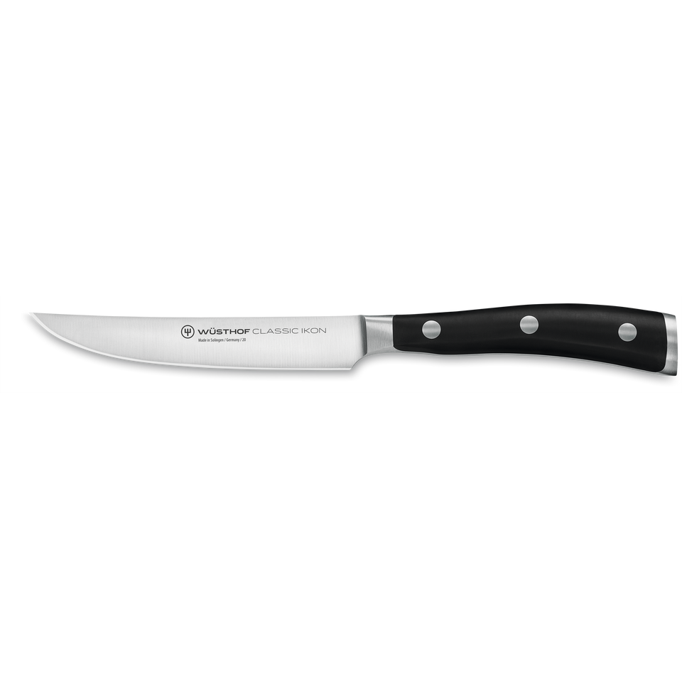 Classic Ikon 4 1/2" Steak Knife featuring a finely forged German steel blade with a sleek triple-riveted black handle for precise steak cutting.