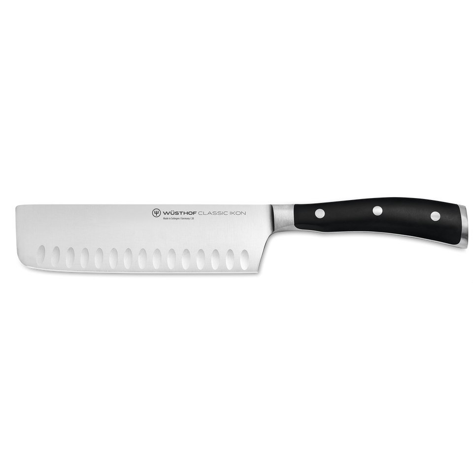Classic Ikon 7" Hollow Edge Nakiri with a precision-forged German steel blade and ergonomic triple-riveted black handle for efficient vegetable slicing.