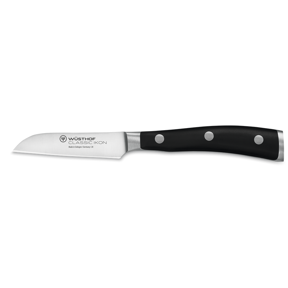 Classic Ikon 3" Flat Cut Paring Knife featuring a forged German steel blade and ergonomic triple-riveted black handle for precise kitchen tasks.