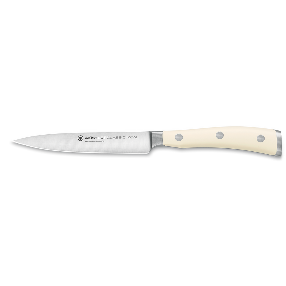 Classic Ikon 4 1/2" Utility Knife with a sharp forged German steel blade and smooth ivory triple-riveted handle for precision kitchen tasks.