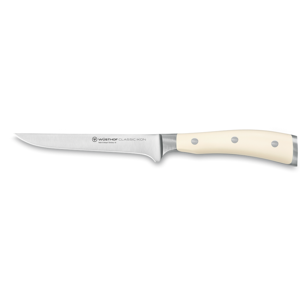 Classic Ikon 5" Boning Knife with a slender forged German steel blade and smooth ivory triple-riveted handle for precise meat preparation.