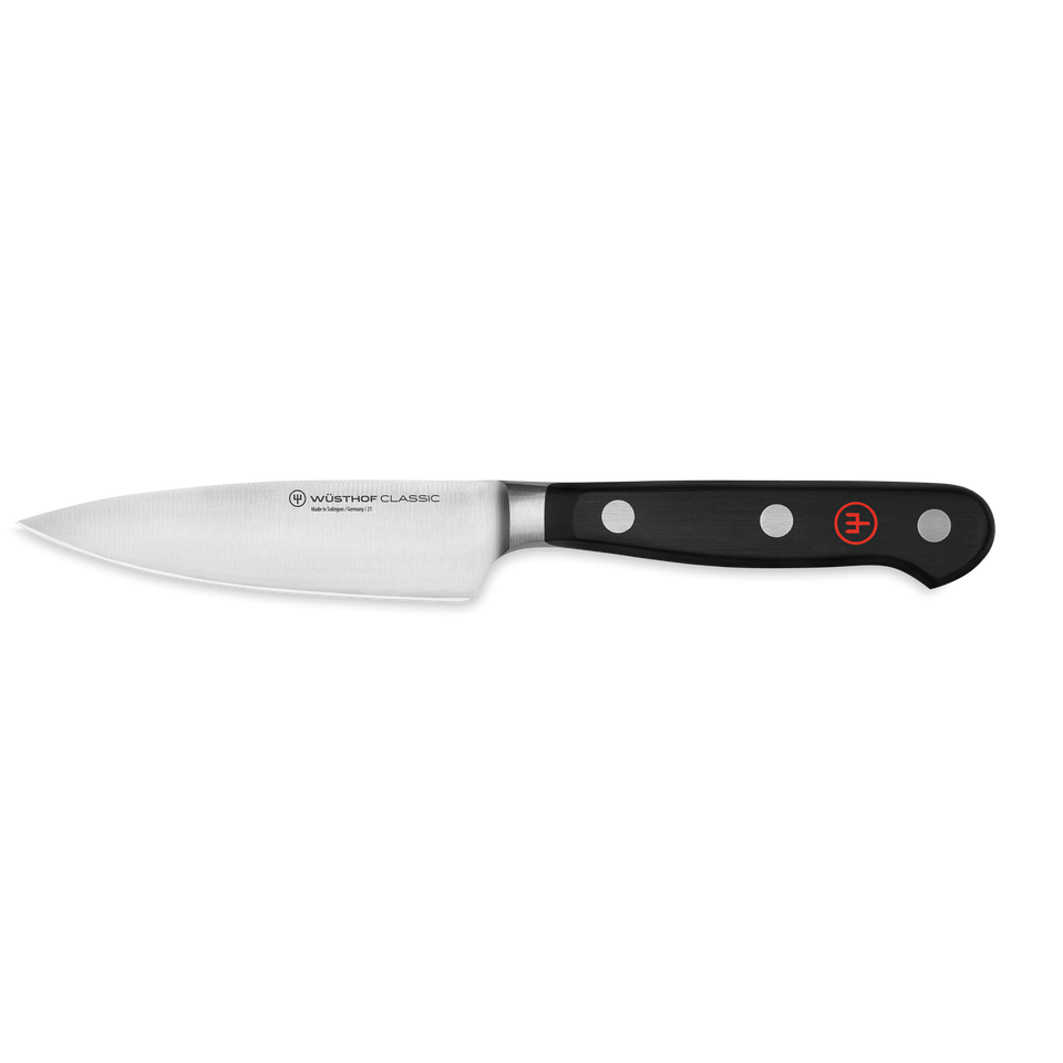 Classic 4" Extra Wide Paring Knife featuring a sharp forged German steel blade with a sturdy black ergonomic handle and triple rivets for control.