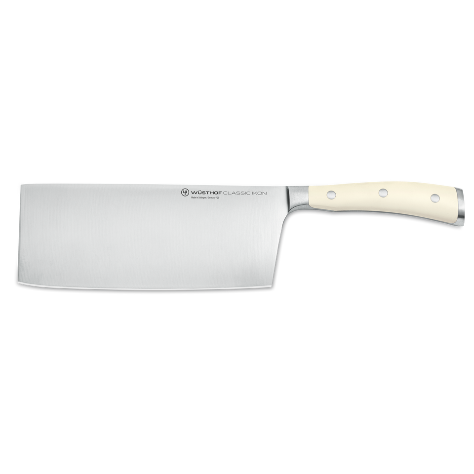 Classic Ikon 7" Chinese Chef's Knife with a wide forged German stainless steel blade and an ivory-colored ergonomic handle with polished rivets.