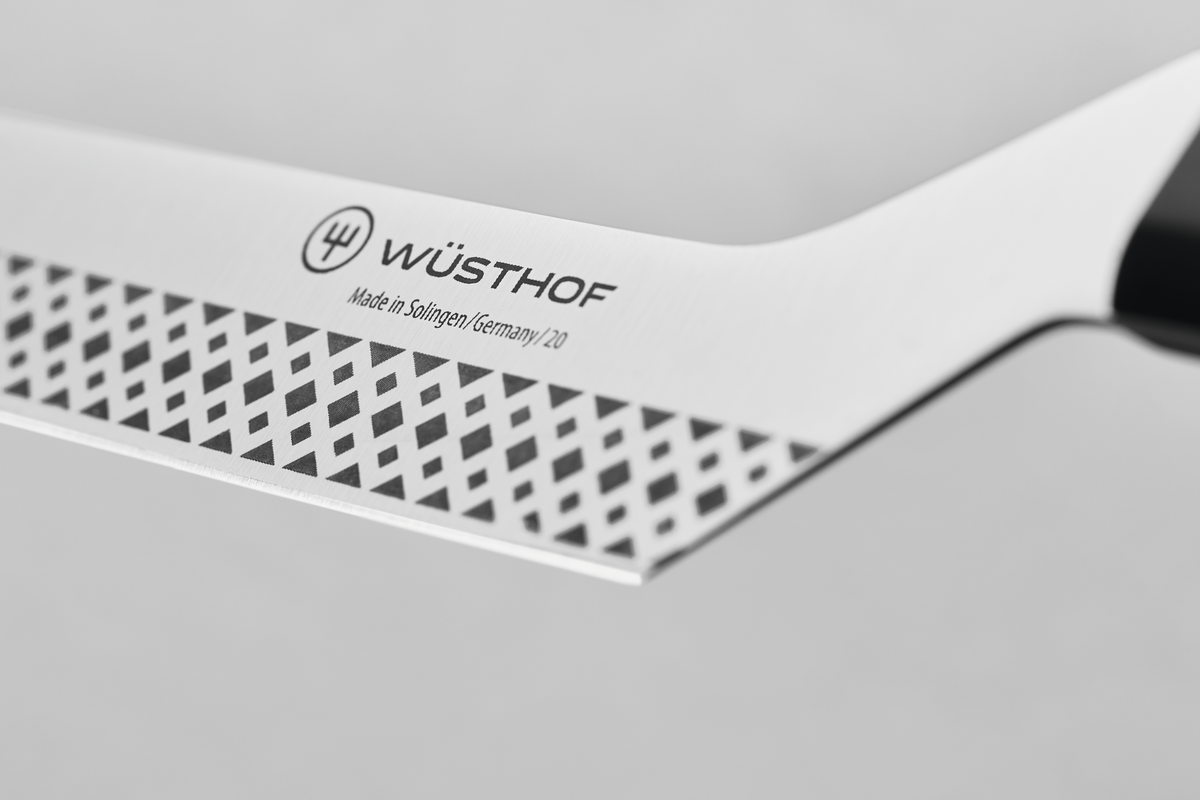 4 1/2" Cheese Knife featuring a precision-forged stainless steel blade with a patterned edge and a polished black ergonomic handle.