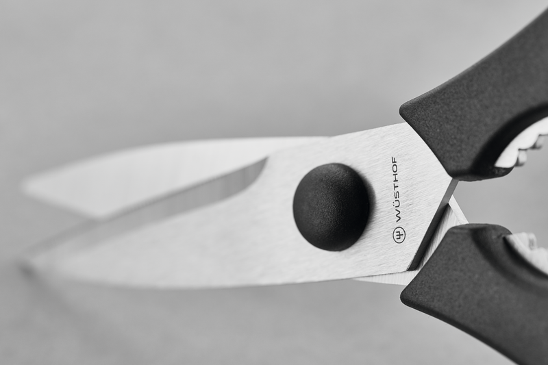 Classic Ikon 11-Piece Knife Block Set featuring durable kitchen shears with stainless steel blades and textured black ergonomic handles for a secure grip.