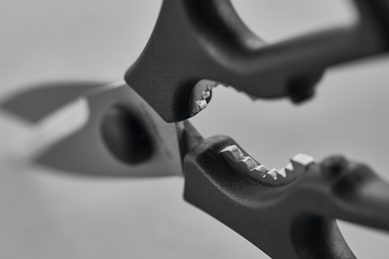 Pull-Apart Kitchen Shears with durable serrated stainless steel blades and ergonomic black handles designed for efficient and precise cutting tasks.