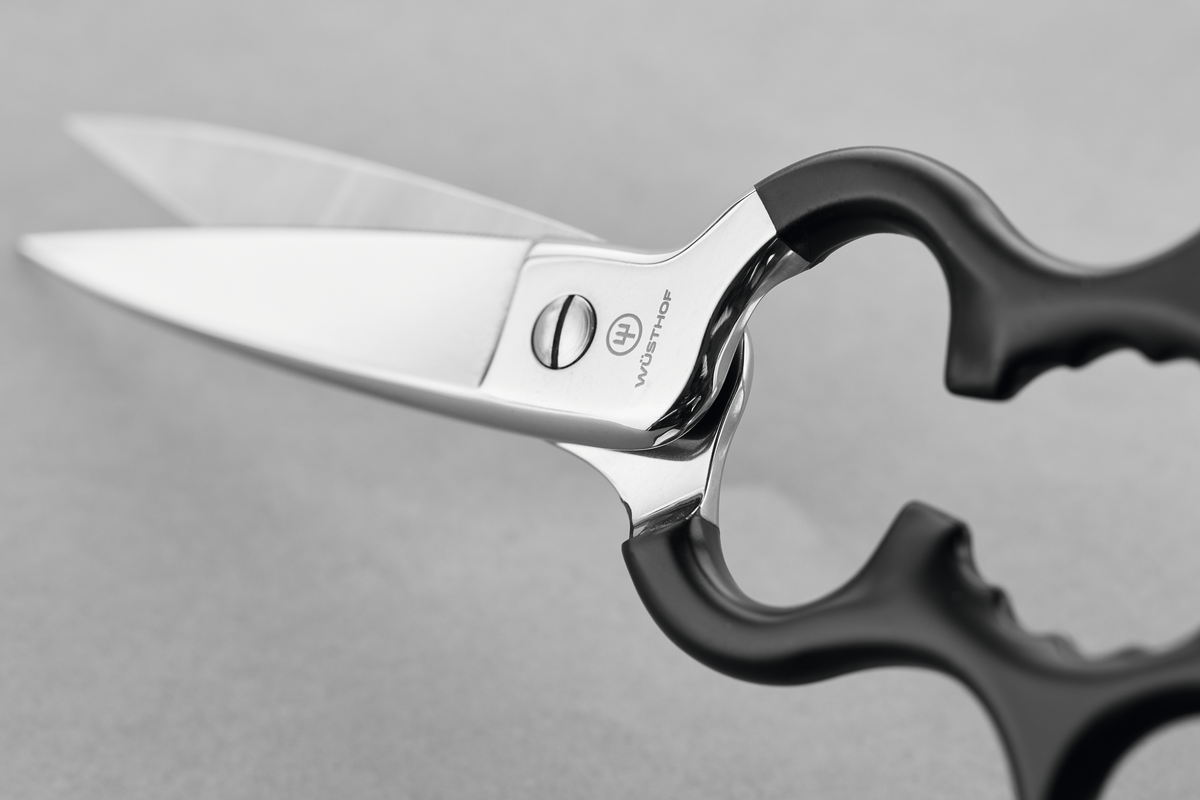 Stainless Kitchen Shears with Synthetic Grips featuring sharp stainless steel blades and ergonomically designed black handles for comfortable, precise kitchen cutting.