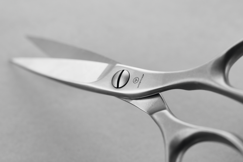 Brushed Stainless Kitchen Shears with precisely crafted sharp blades and a sleek, ergonomic design for superior cutting performance in the kitchen.