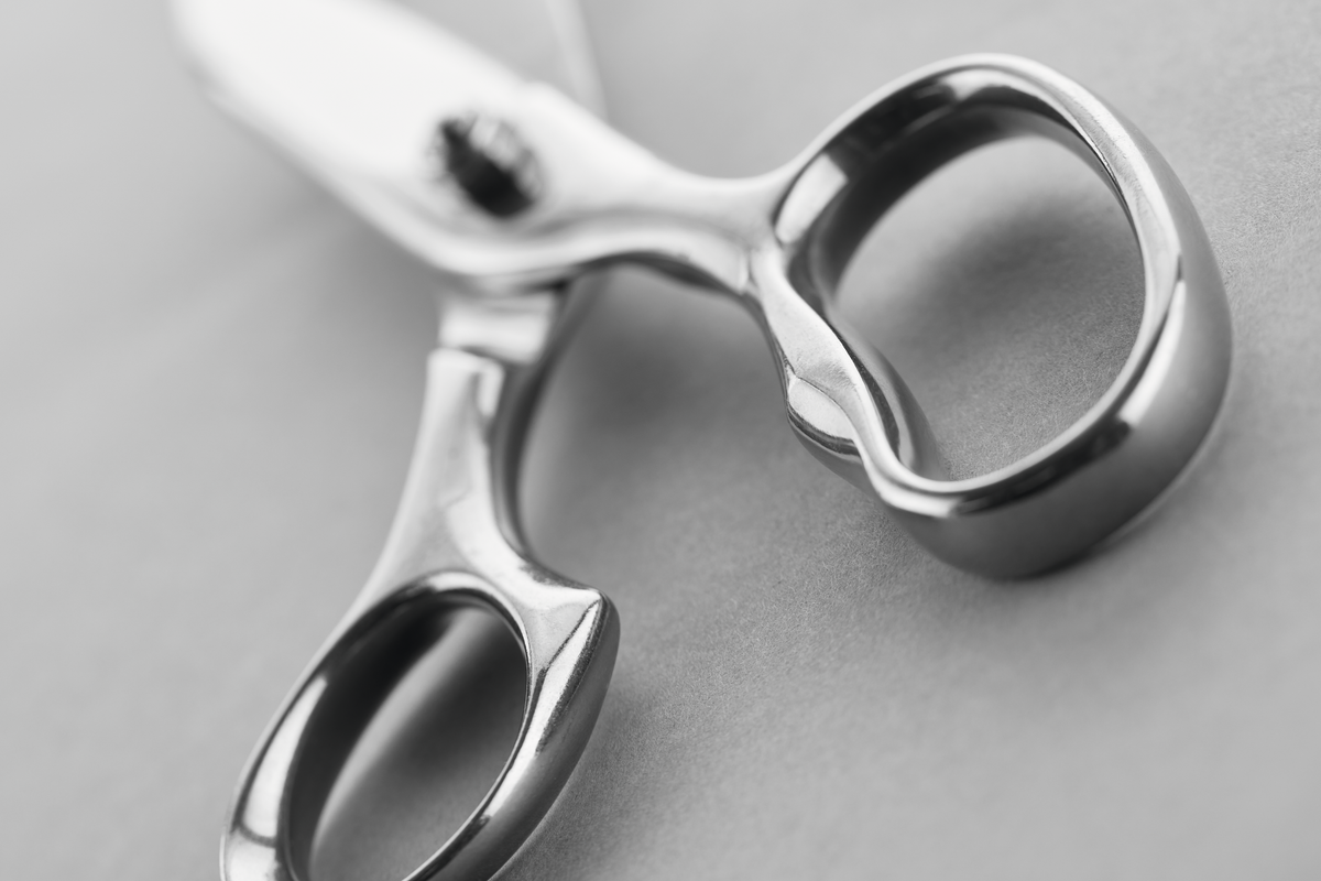 8" Kitchen Shears with ergonomic stainless steel handles and precision-polished blades designed for comfortable and accurate cutting tasks.