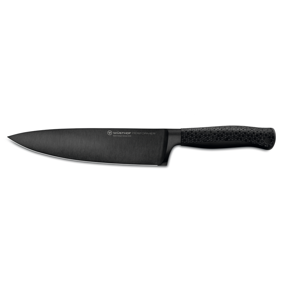 Performer 8" Chef's Knife with a sleek black forged German steel blade and a textured handle featuring a hexagonal pattern for superior grip and control.