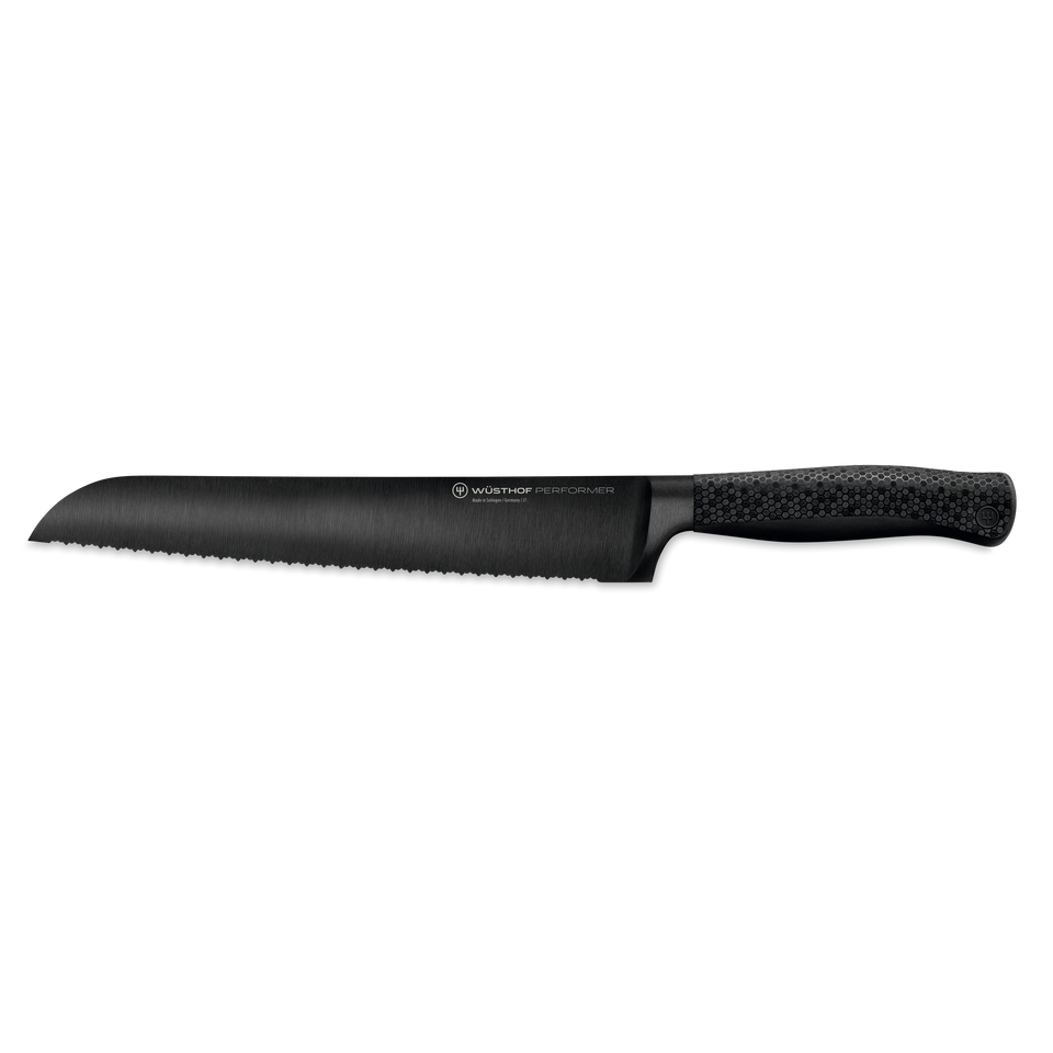 Performer 9" Precision Double-Serrated Bread Knife with a sleek black forged blade and textured ergonomic handle designed for precision cutting.