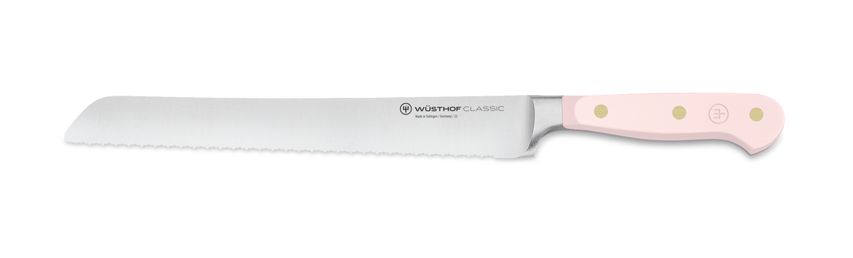 Classic 3-Piece Essential Knife Set - Pink Himalayan Salt featuring a forged German serrated bread knife with sharp stainless steel blade and ergonomic pink handle with brass rivets.