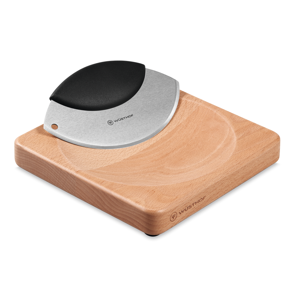 2-Piece Mincing Set featuring a curved stainless steel blade with a black ergonomic handle and a compact wooden cutting board with a carved groove.