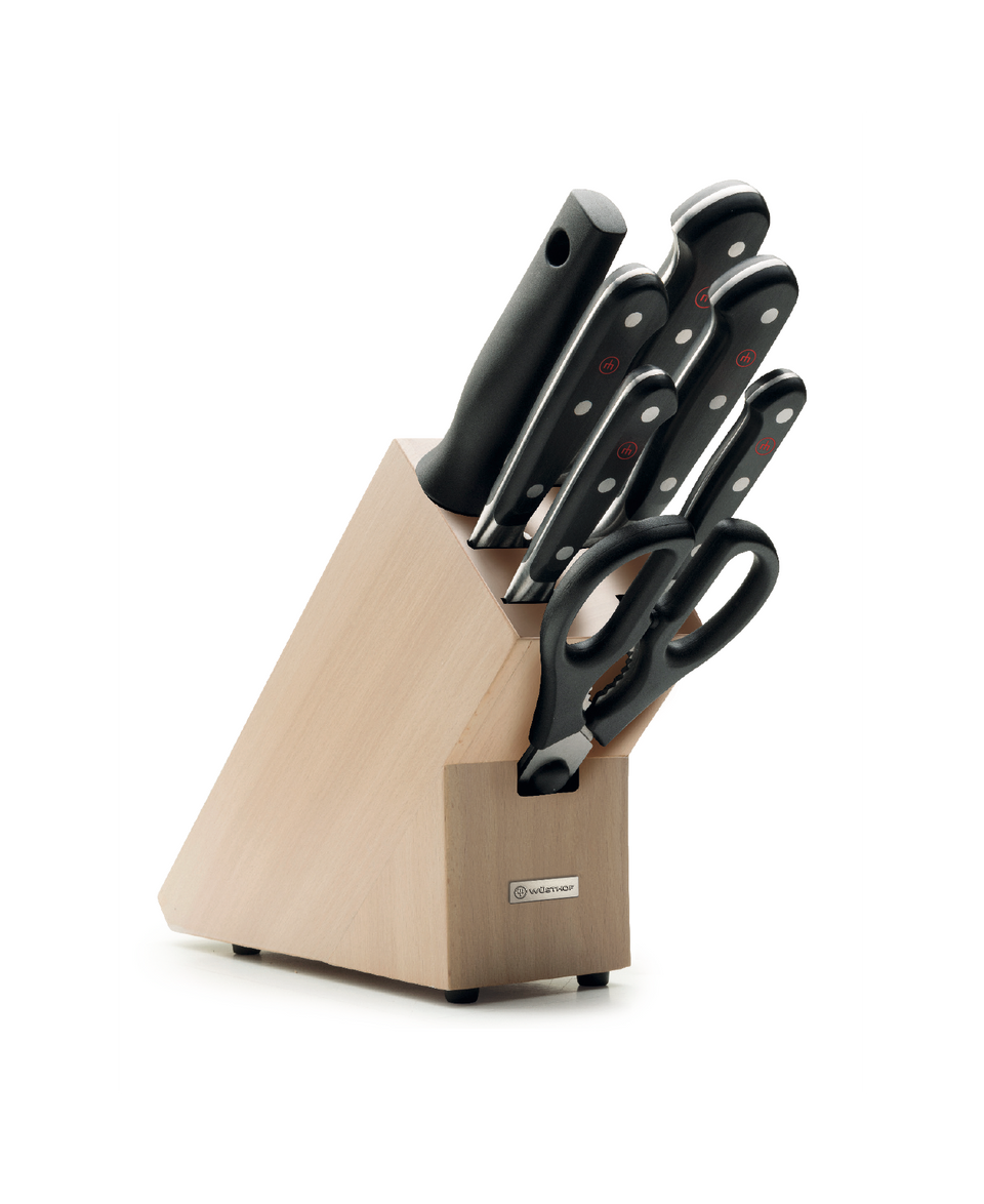 Classic 8-Piece Knife Block Set featuring forged German knives with triple-riveted black handles and a natural wood block for organized kitchen use.
