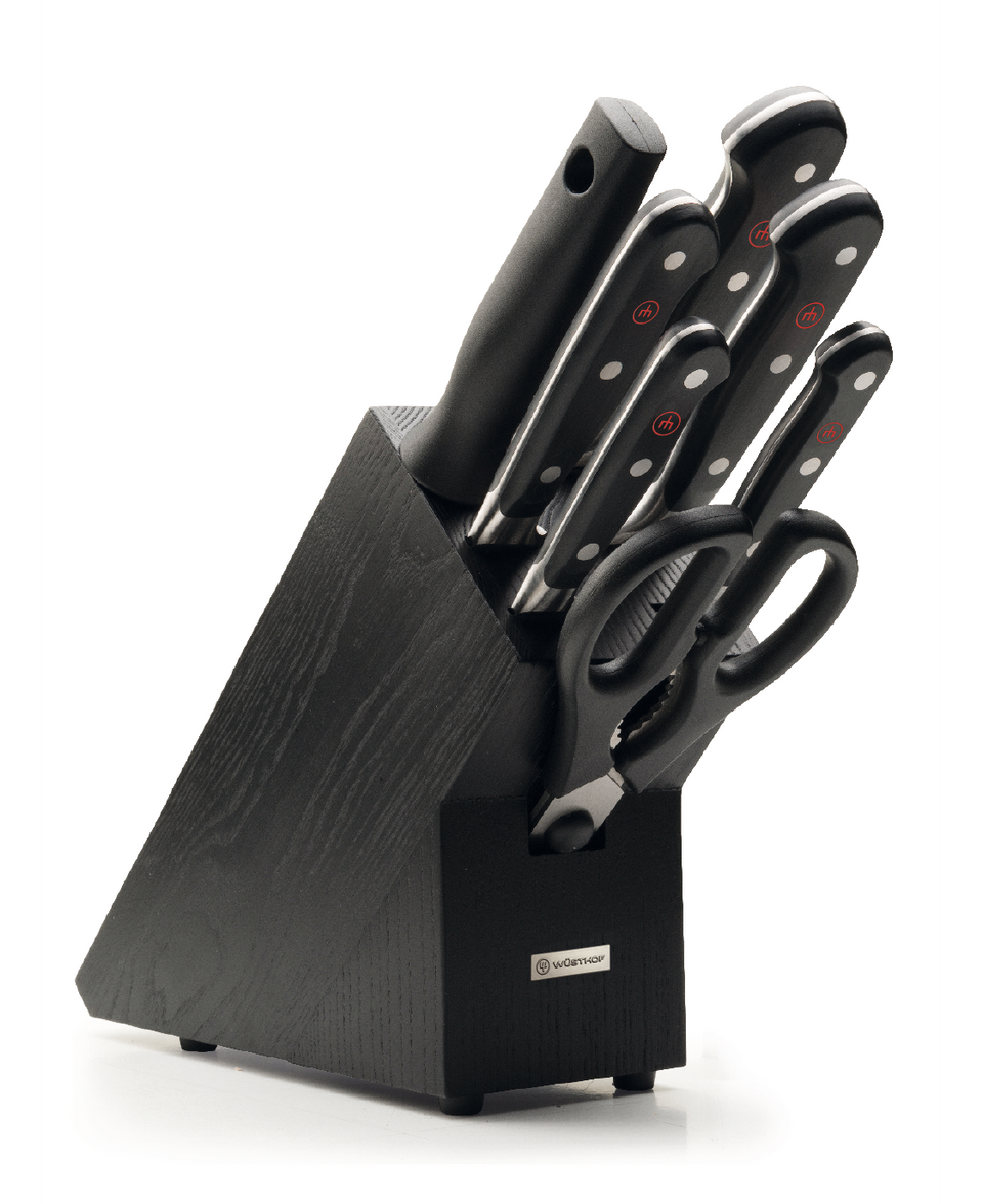 Classic 8-Piece Knife Block Set with forged German knives featuring triple-riveted black handles, including kitchen shears and a black wood storage block.