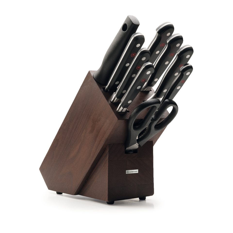 Classic 10-Piece Knife Block Set featuring a dark wood holder with forged German kitchen knives and ergonomic black handles, including kitchen scissors.