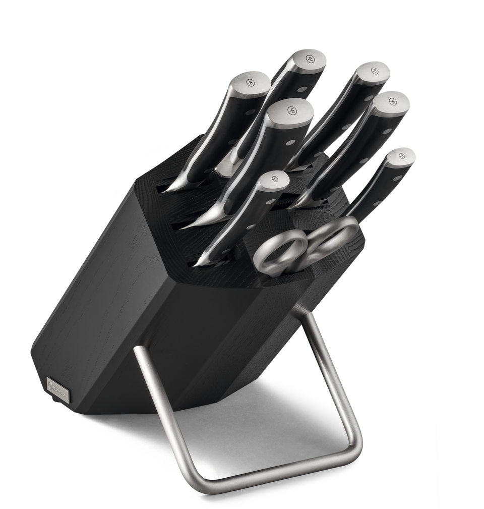 Classic Ikon 9-Piece Knife Block Set with forged German knives featuring black ergonomic handles, full tang construction, and a dark wooden block with stainless steel stand.