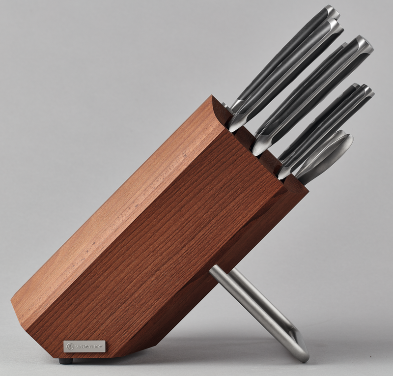 8-Slot Heat Treated Beech Knife Block with polished stainless steel knives featuring ergonomic handles and a sleek modern design.