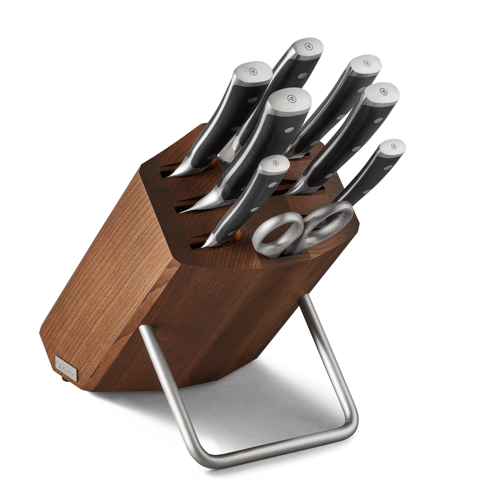 Classic Ikon 9-Piece Knife Block Set featuring forged German knives with sharp blades, ergonomic black handles with polished rivets, and a dark wood block with stainless steel stand.