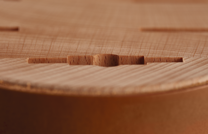 Villa 6-Slot Knife Block close-up showing smooth wooden surface with precise slot details and natural wood grain texture.
