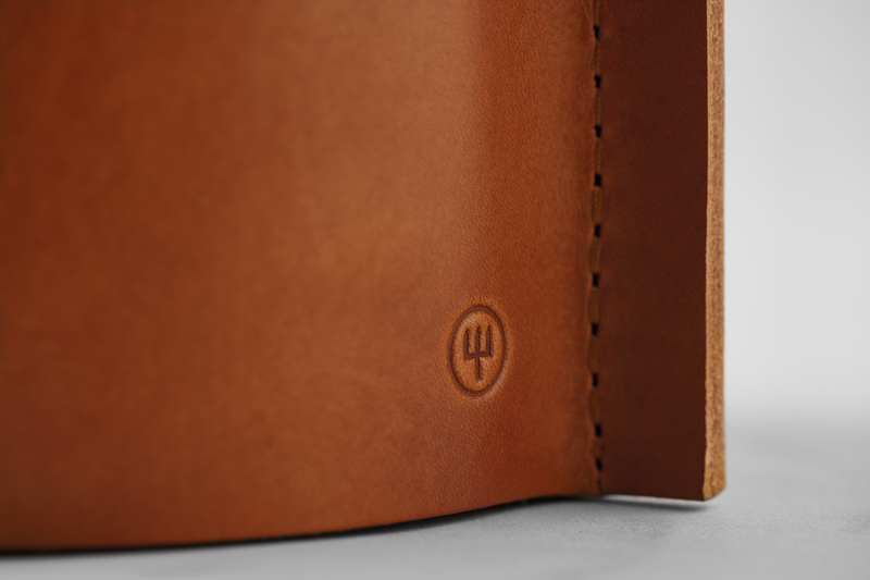 Villa 6-Slot Knife Block close-up of smooth tan leather exterior with subtle embossed WÜSTHOF logo and detailed stitching along edge.