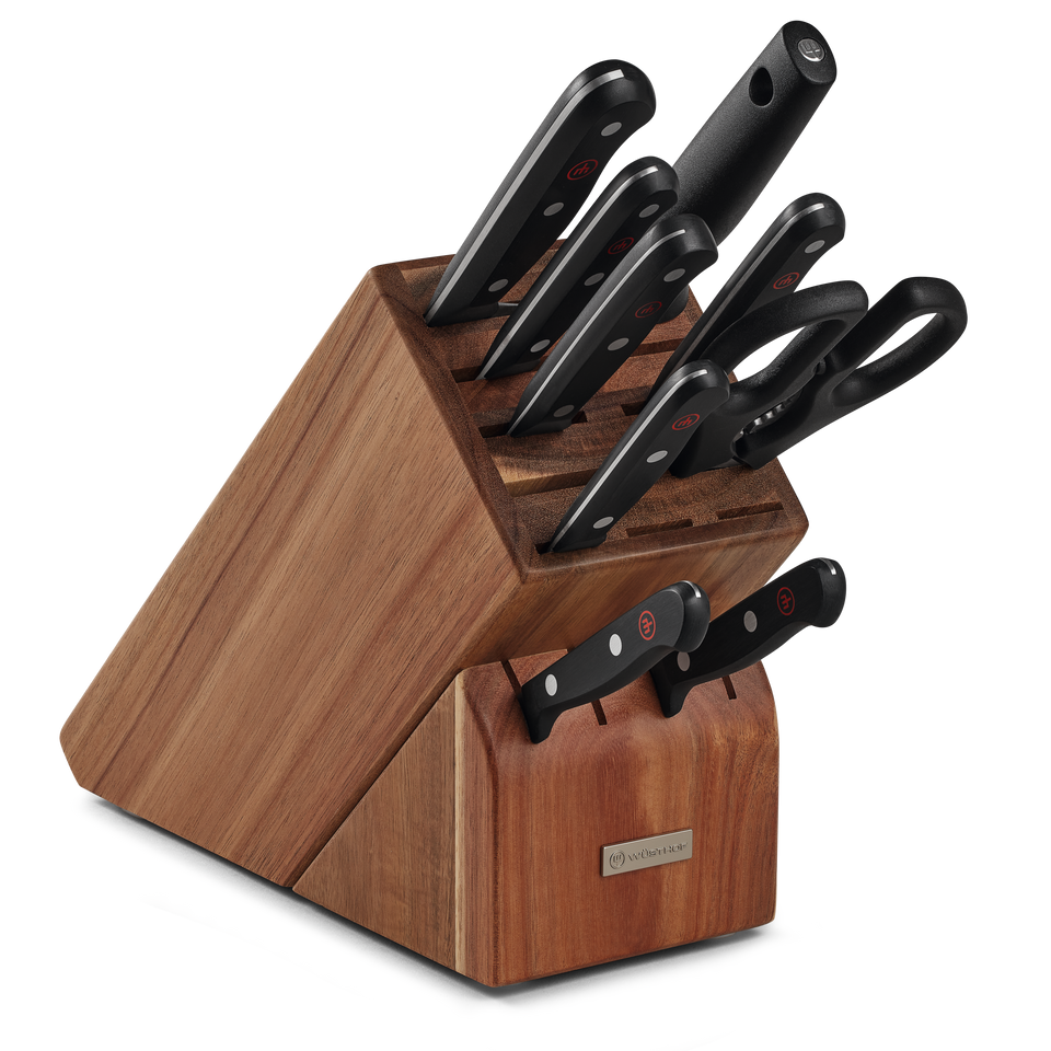 Gourmet 10-Piece Knife Block Set displaying forged German knives with ergonomic black handles neatly organized in a polished wooden block.