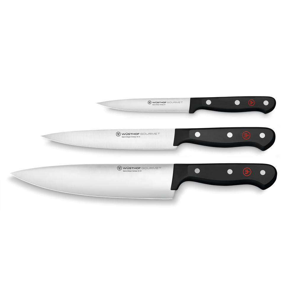 Gourmet 3-Piece Knife Set featuring a paring knife, utility knife, and chef’s knife with forged German steel blades and black triple-riveted handles for versatile kitchen tasks.