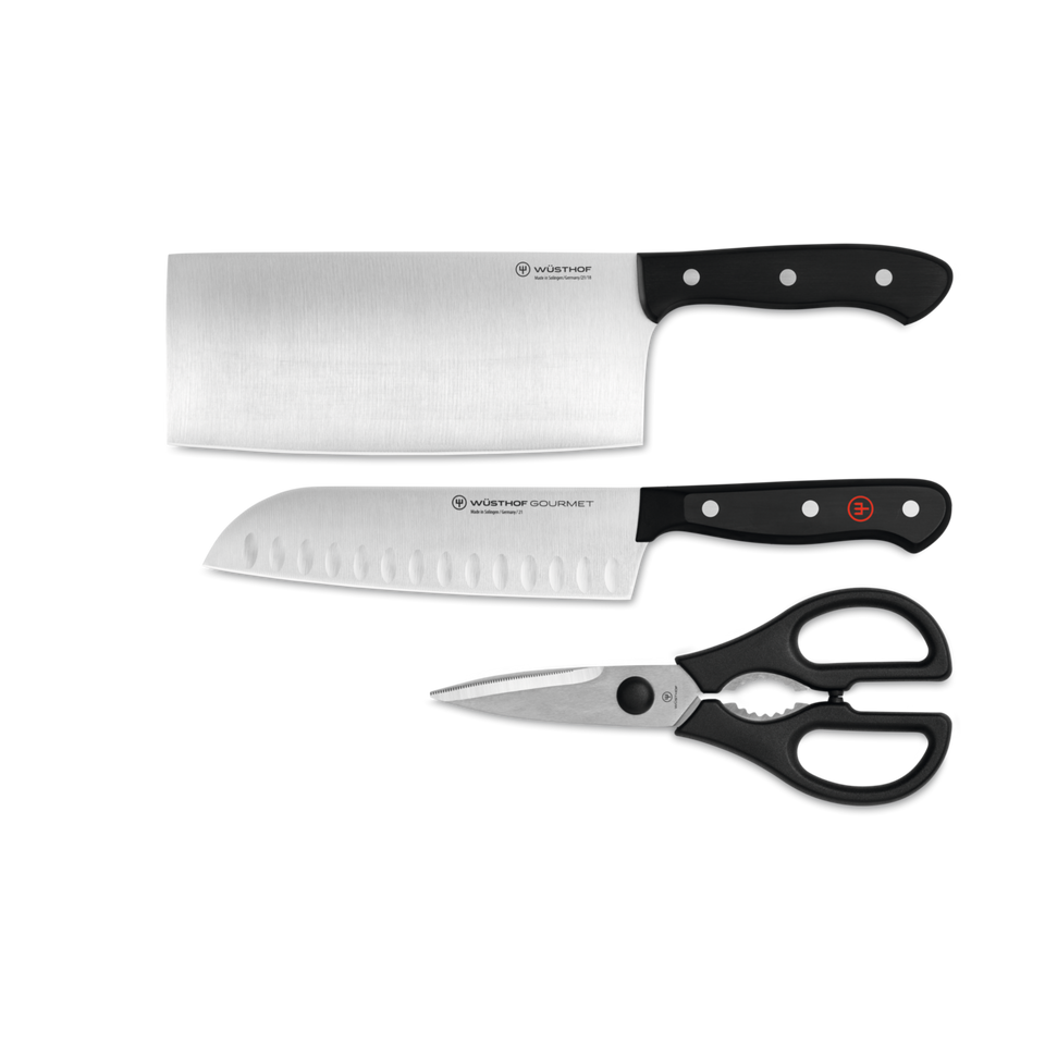 Gourmet 3-Piece Utility Set featuring a cleaver, santoku knife with Granton edge, and kitchen shears with black triple-riveted handles and forged German steel blades.
