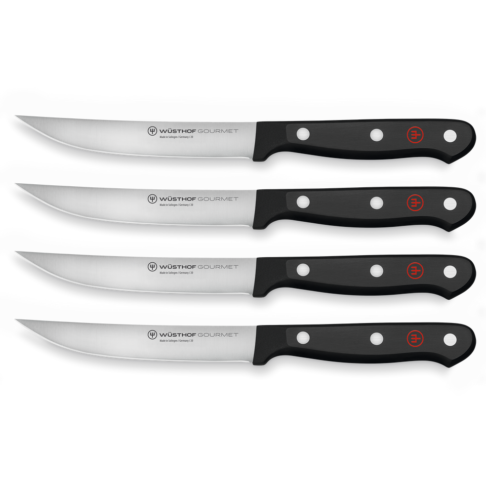 Gourmet 4-Piece Steak Knife Set featuring sharp forged German steel blades with black ergonomic handles and triple-riveted construction for durability and precision.