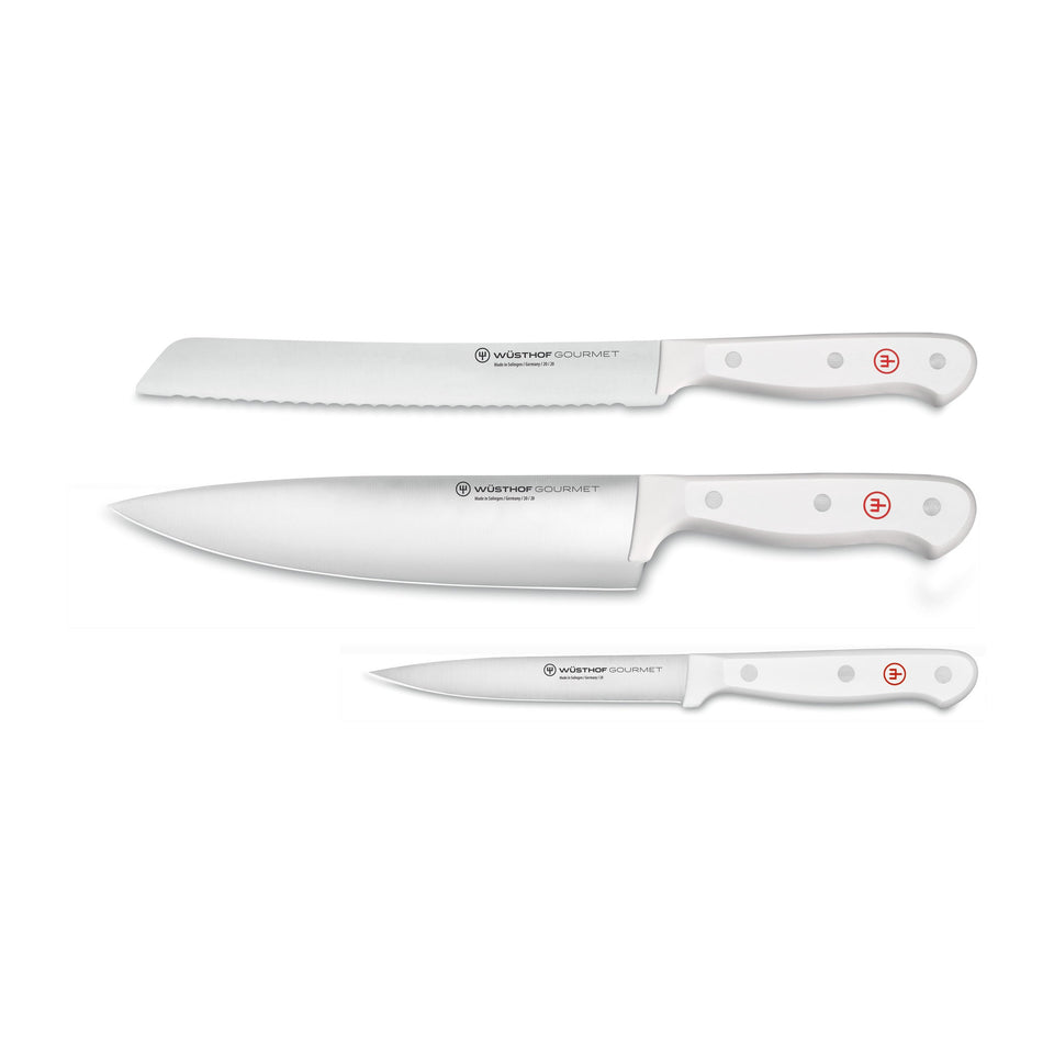 Gourmet 3-Piece Starter Knife Set with forged German stainless steel blades and white ergonomic handles featuring rivet detailing for versatile kitchen use.
