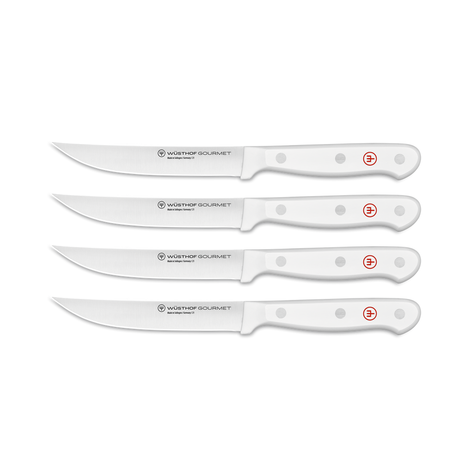 Gourmet 4-Piece Steak Knife Set featuring sharp forged German steel blades with triple-riveted white ergonomic handles for comfortable, precise slicing.