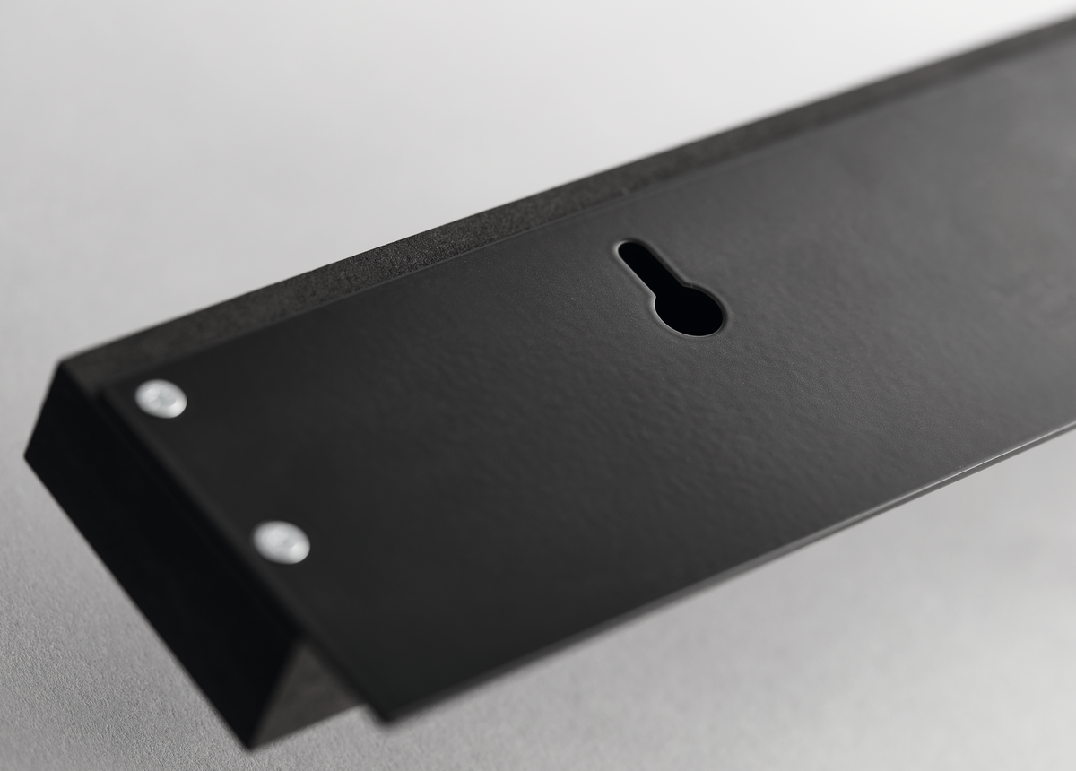 16" Magnetic Holder in matte black, featuring a keyhole slot for secure wall mounting and durable metal construction.
