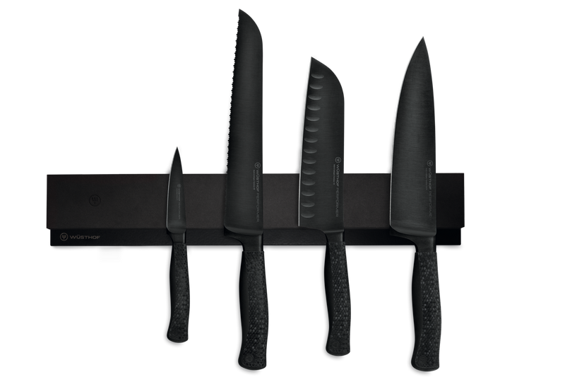 16" Magnetic Holder displaying a set of black forged kitchen knives with textured handles, highlighting sleek German craftsmanship.
