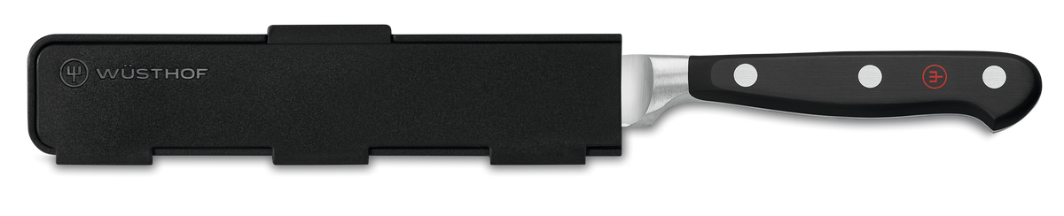 Narrow Magnetic Blade Guard in sleek black with discreet WÜSTHOF logo, designed for safe storage and protection of forged kitchen knives.