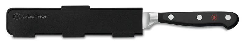 Narrow Magnetic Blade Guard in sleek black with discreet WÜSTHOF logo, designed for safe storage and protection of forged kitchen knives.