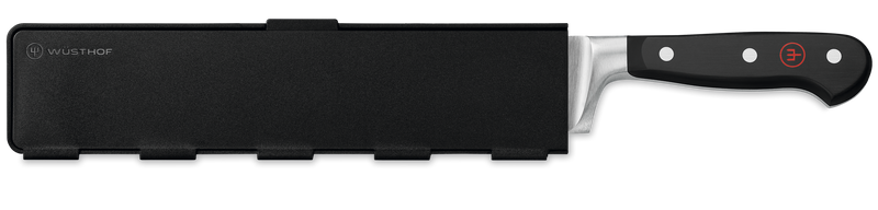 Wide Magnetic Blade Guard in black with subtle WÜSTHOF logo, protecting the blade of a forged German kitchen knife with polished black handle and metal rivets.