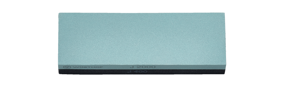 Whetstone J 400 / 2000 sharpening stone with dual grit surfaces in muted teal for sharpening and refining edges on WÜSTHOF forged kitchen knives.