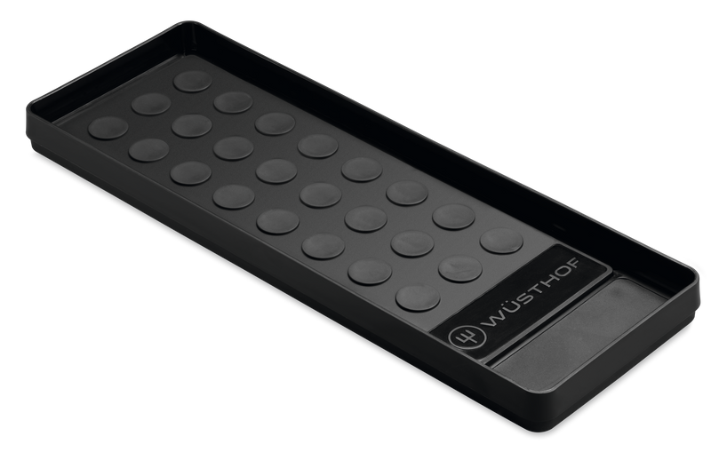 Whetstone Non-slip Holder in black, featuring raised circular grips and WÜSTHOF logo, designed to keep sharpening stones stable during use.