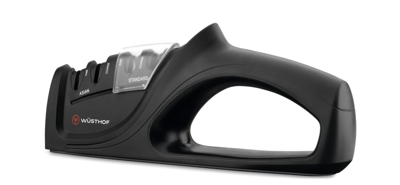 Universal Hand-Held Knife Sharpener with black ergonomic handle and dual sharpening slots labeled Asian and Standard, designed for WÜSTHOF knives.