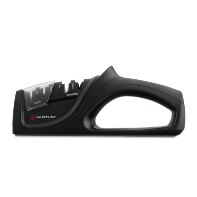 Universal Hand-Held Knife Sharpener with ergonomic black handle, featuring dual sharpening slots labeled Asian and Standard, designed for WÜSTHOF knives.