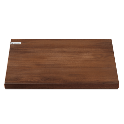 Heat-Treated Beech Cutting Board with a deep, warm wood tone and smooth surface, featuring a subtle WÜSTHOF logo plate for kitchen use.
