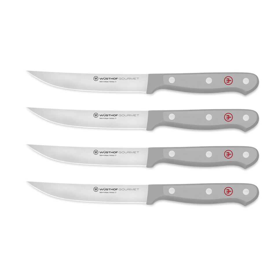 Gourmet 4-Piece Steak Knife Set featuring sharp forged German steel blades with triple-riveted gray ergonomic handles and red logo for balanced control.