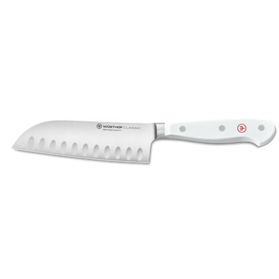 Classic 5" Hollow Edge Santoku featuring a forged stainless steel blade with oval indentations and a triple-riveted white ergonomic handle for precise kitchen use.