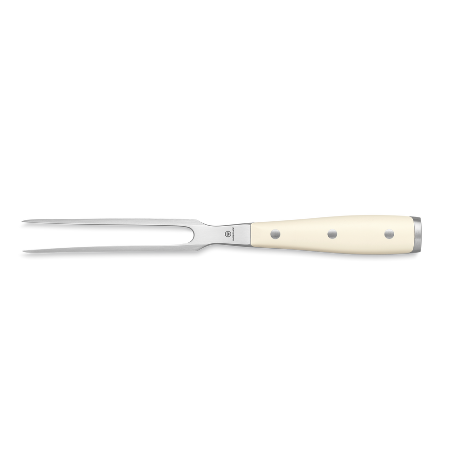 Classic Ikon 6" Straight Meat Fork featuring a white ergonomic handle with polished rivets and a sharp forged steel fork for precise carving.
