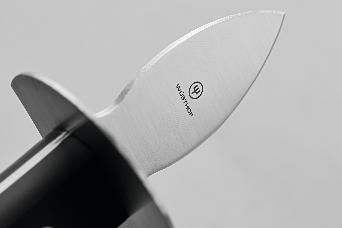 Oyster Opener featuring a polished stainless steel blade engraved with the WÜSTHOF logo and a black ergonomic handle for secure grip.